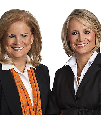 Portrait of Lee Stratton & Debbie Momberg, REALTOR®.